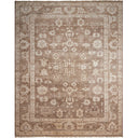Exquisite handmade rug with complex geometric and floral motifs on muted beige and brown palette.