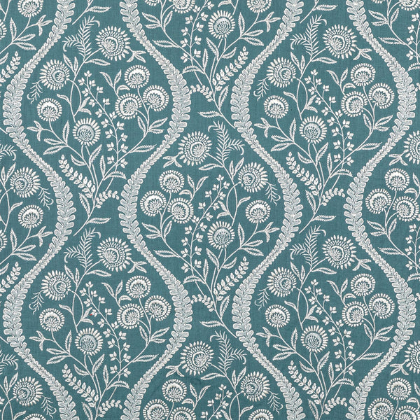 Teal background with a floral motif pattern in cream shade.