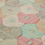 Close-up of a handmade patchwork fabric with vibrant colors and frayed edges.