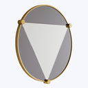 Circular decorative wall mirror with a modern, geometric design.