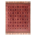 Traditional red rug with intricate floral and geometric design motifs.