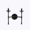 Symmetrical candle-style light fixture with minimalist design and dark finish.