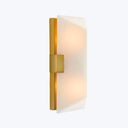 Sleek, contemporary wall-mounted light fixture with warm frosted glow.