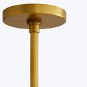 Simple and elegant modern lamp with golden stand and shade.
