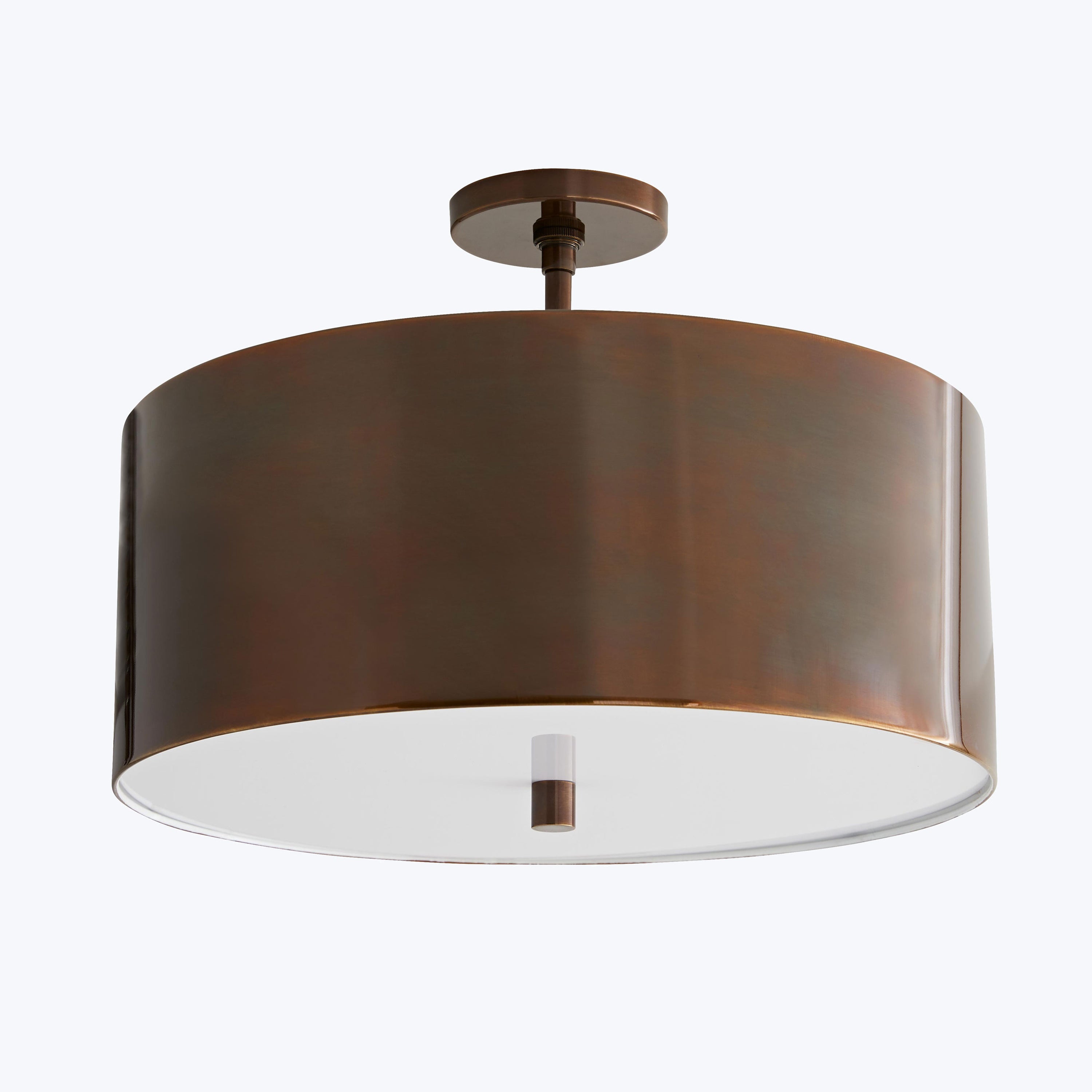 Ceiling mounted flush mount light with sleek bronze design.
