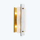 Modern wall sconce with sleek design and warm gold finish.