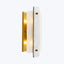 Modern wall sconce with sleek design and warm gold finish.