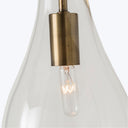 Close-up of vintage-style lamp with warm incandescent bulb.