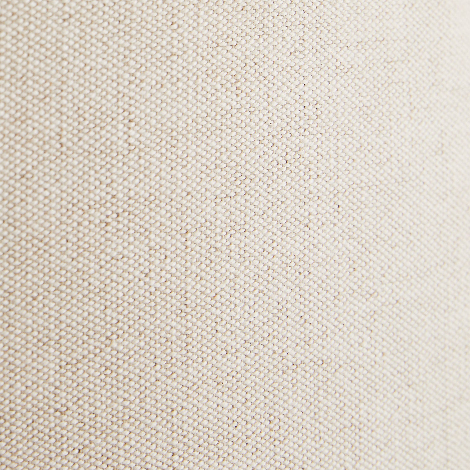Close-up of fine, tightly woven beige fabric with uniform pattern.