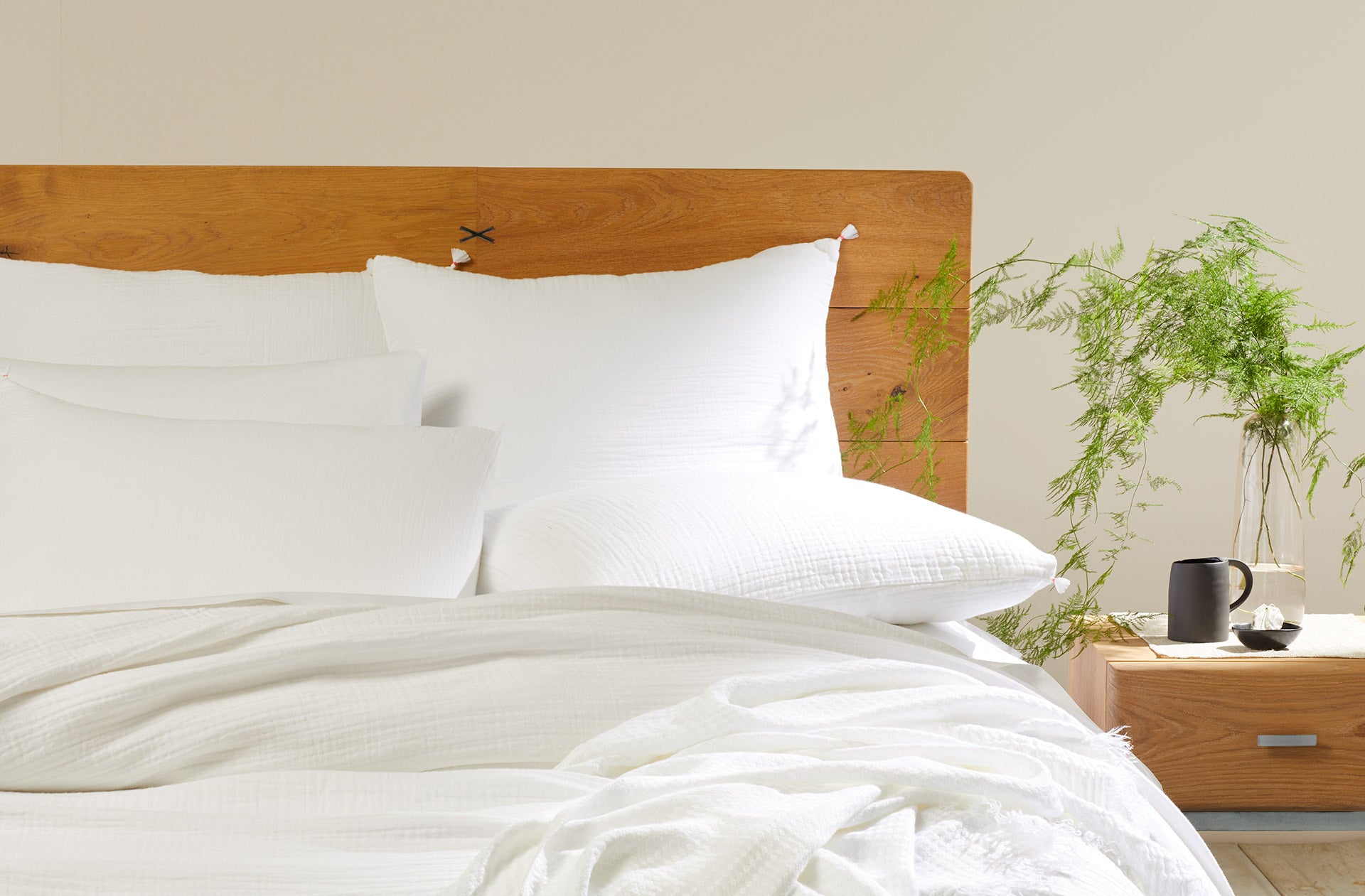 white organic bedding oak bedframe