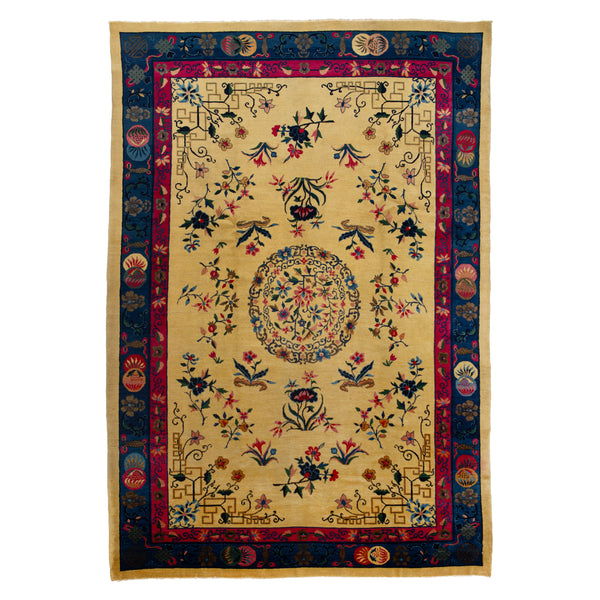 Handwoven decorative rug with intricate floral design on white background.