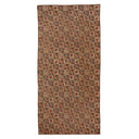 Traditional floral patterned rug in beige, brown, and red tones.