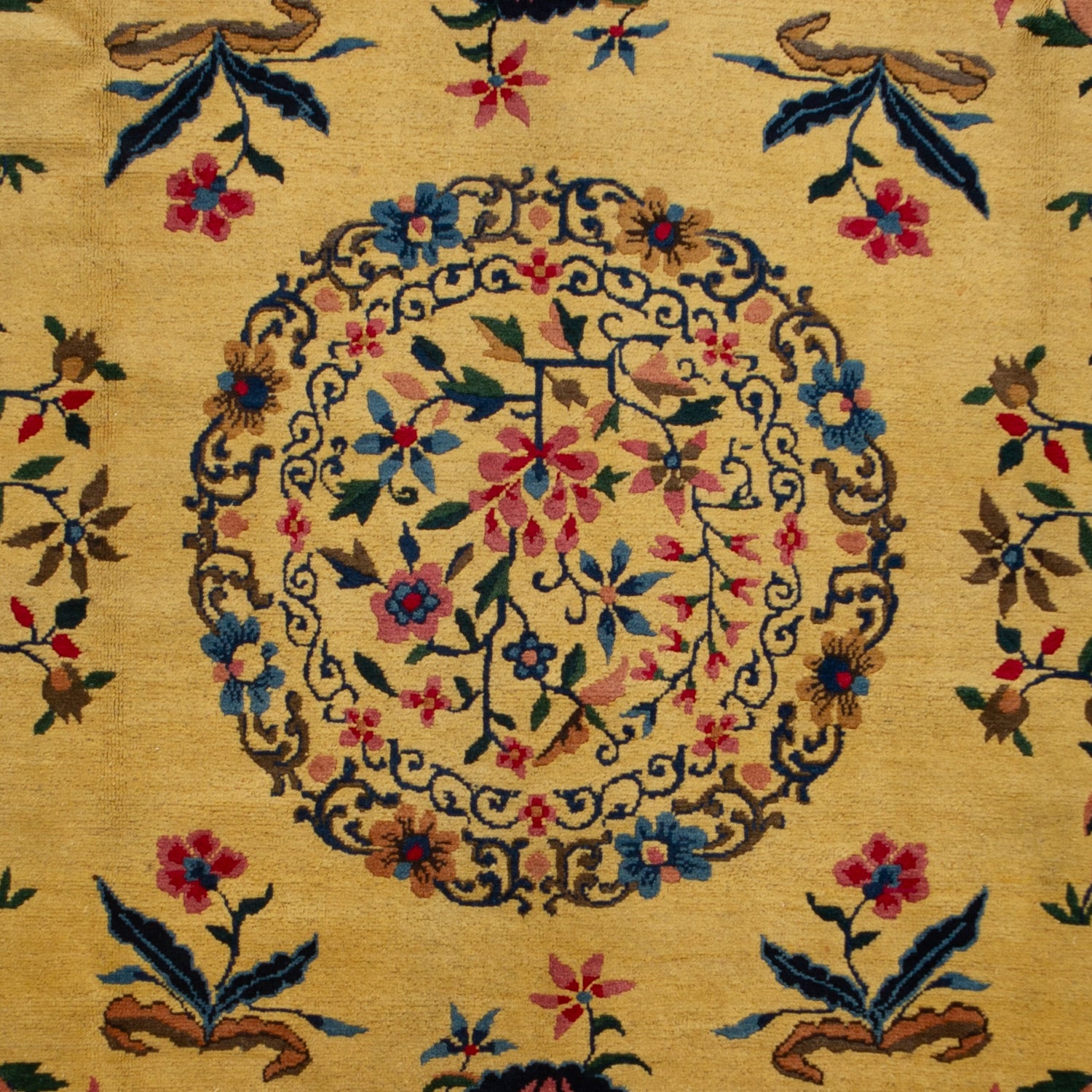 Traditional Oriental rug with intricate floral patterns in vibrant colors.