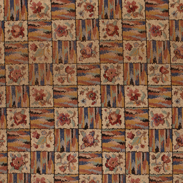 Close-up view of rustic floral patterned textile in earth tones.