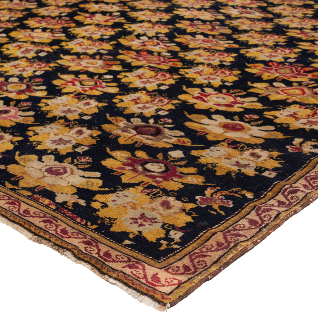 Colorful floral motif area rug with intricate patterns on display.