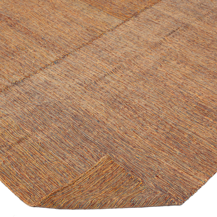 Earth-toned herringbone fabric with V-shape weaving on white background.