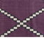 Geometric design textile with checkered pattern in muted purple background.