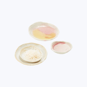 Handmade oval ceramic plate with cream color and brown speckles. - hover