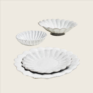 White scalloped dish with shell design, elegant and decorative piece. - hover
