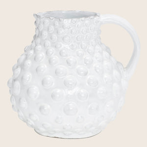 White ceramic pitcher with raised spherical bumps and textured surface - hover