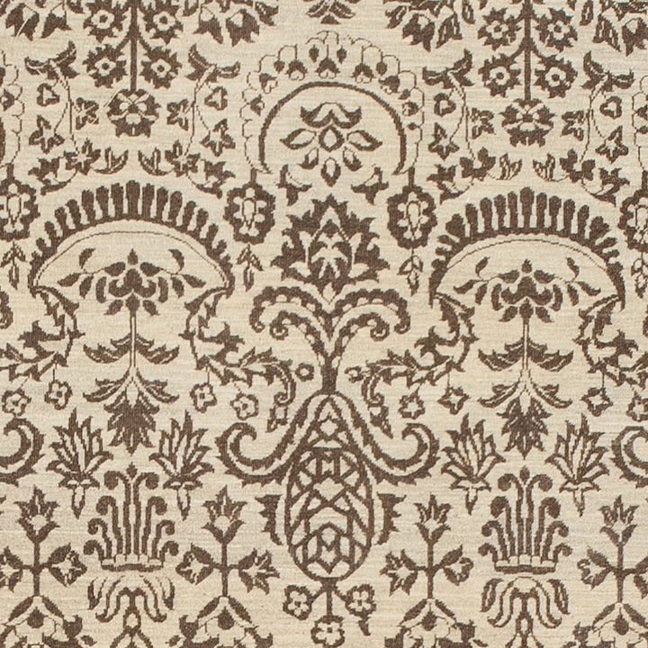 Intricate floral and ornamental design on high-quality traditional rug.