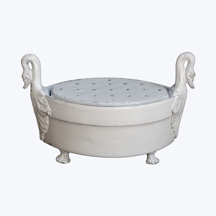 Elegant white garden stool shaped like vintage bathtub with swan necks.
