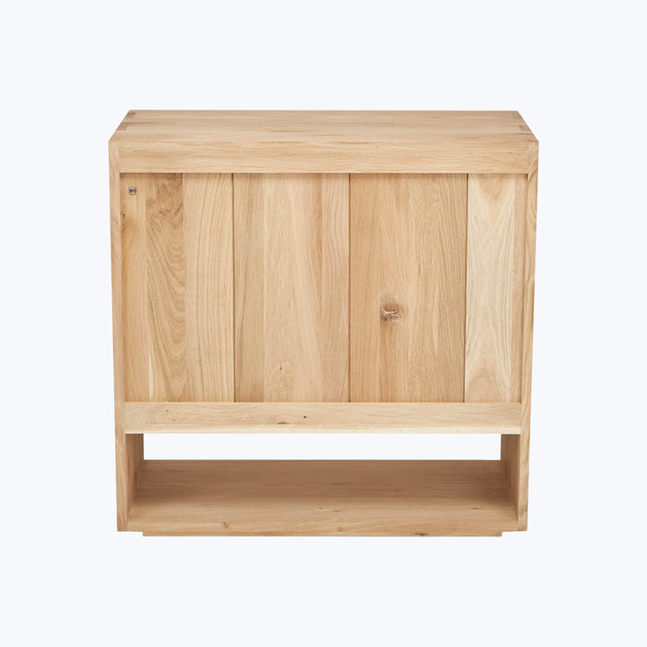 Minimalist oak wood cabinet with open shelves, clean design aesthetic.
