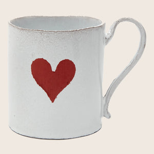 Rustic white mug with distressed texture and painted red heart. - hover