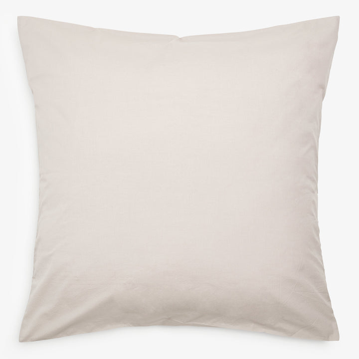 Simple off-white square pillow on white background, soft and comfortable.