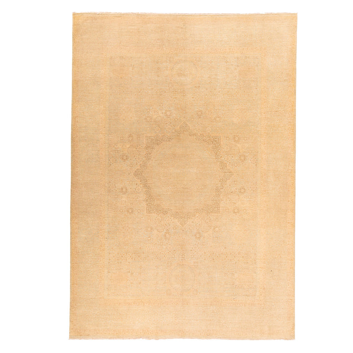 Elegant beige rug with geometric patterns, minimalist design, well-maintained edges.