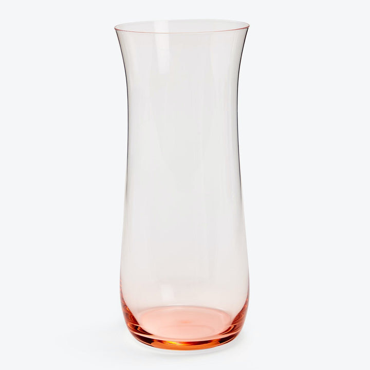 Clear glass vase with flared rim and pinkish tint bottom.