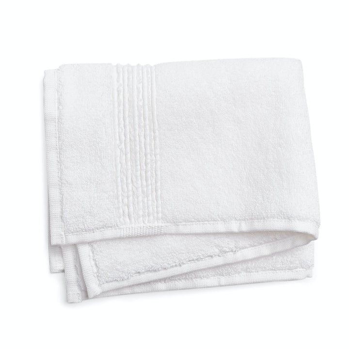 Fresh white bath towel with dobby border, soft and absorbent.