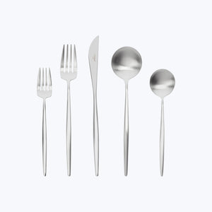 Minimalist silver fork with four tines against white backdrop. - hover