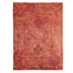 Vintage red and pink ornate Persian-style area rug design.