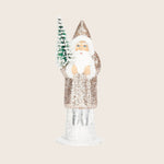 Santa Claus figurine with elongated body and glittery decoration