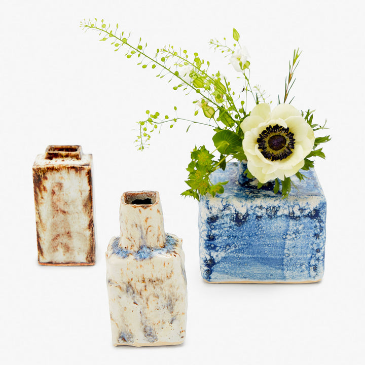 Three ceramic vases showcasing diverse shapes, patterns, and colors.