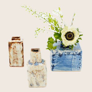 Unique ceramic vase with irregular shape and rustic glazing process. - hover