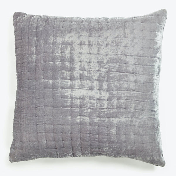 Square grey plush pillow with textured striped ribbed surface design.