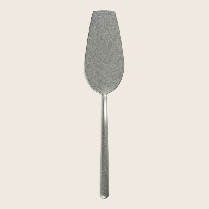 Stainless steel spatula with long handle for kitchen tasks.