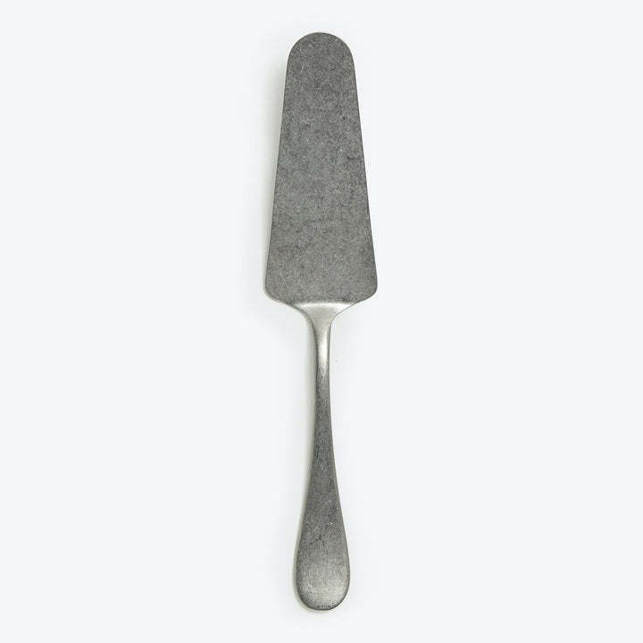Metal spatula with straight blade and textured matte finish utensil.