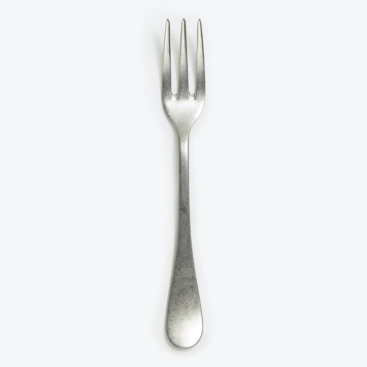 Clean, classic metal fork against white background, simple and elegant.