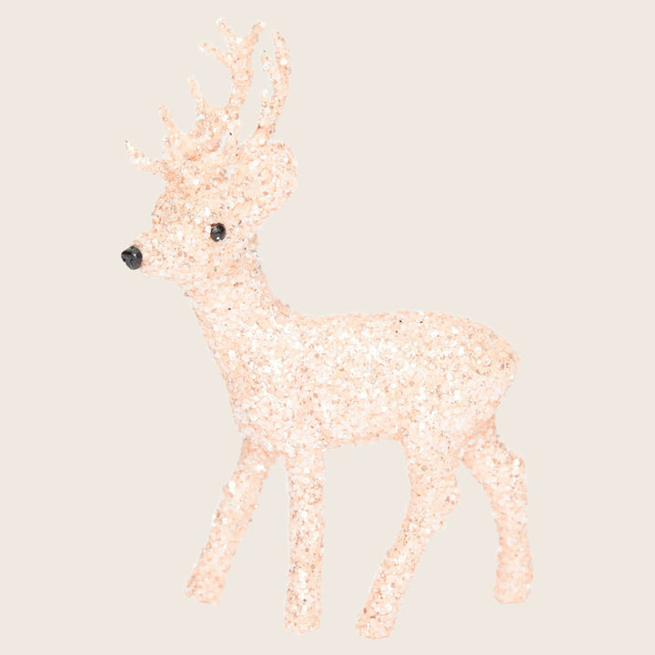 Festive glitter-covered deer figure with shimmering texture for Christmas decor.