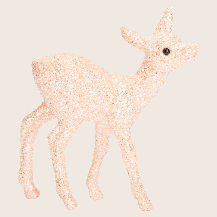 Glittery deer decoration adds festive charm with shimmering elegance.