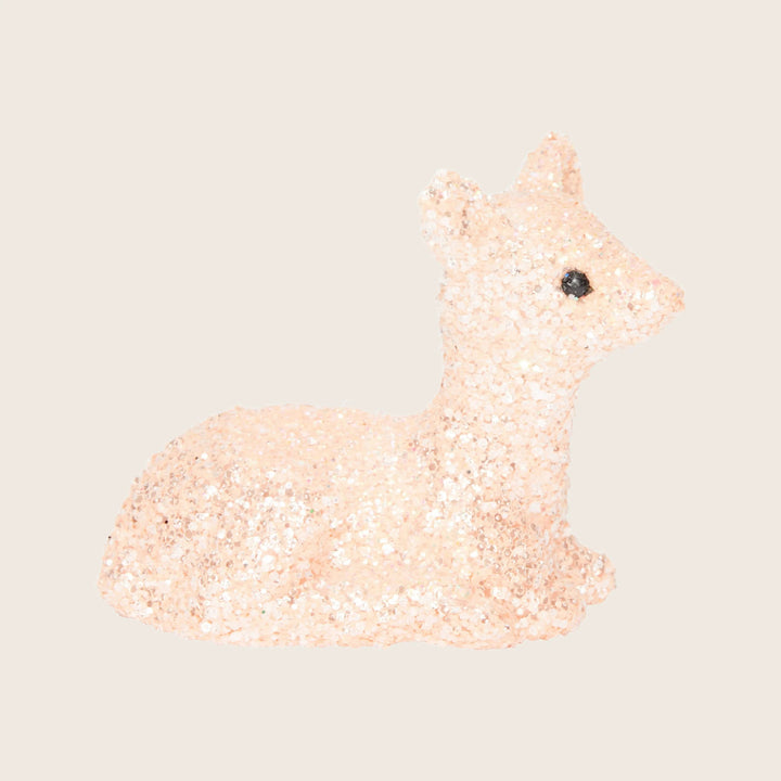 Glittery deer figurine with sparkly embellishments on a white background.