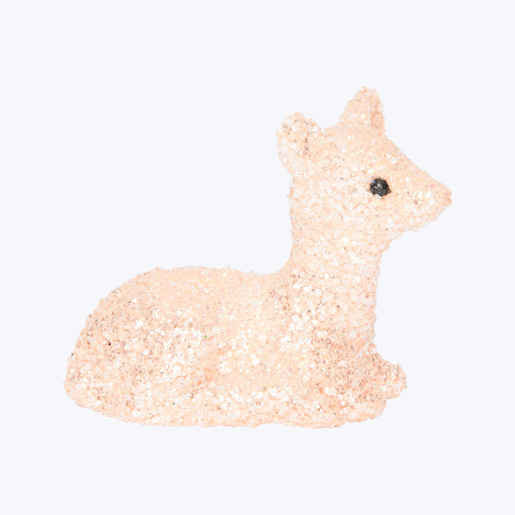 Glittery deer figurine with sparkly embellishments on a white background.