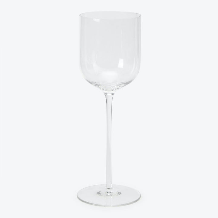 Elegant wine glass with classic design on white background.