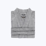 Gray waffle knit sweater with crew neck, cozy and stylish.