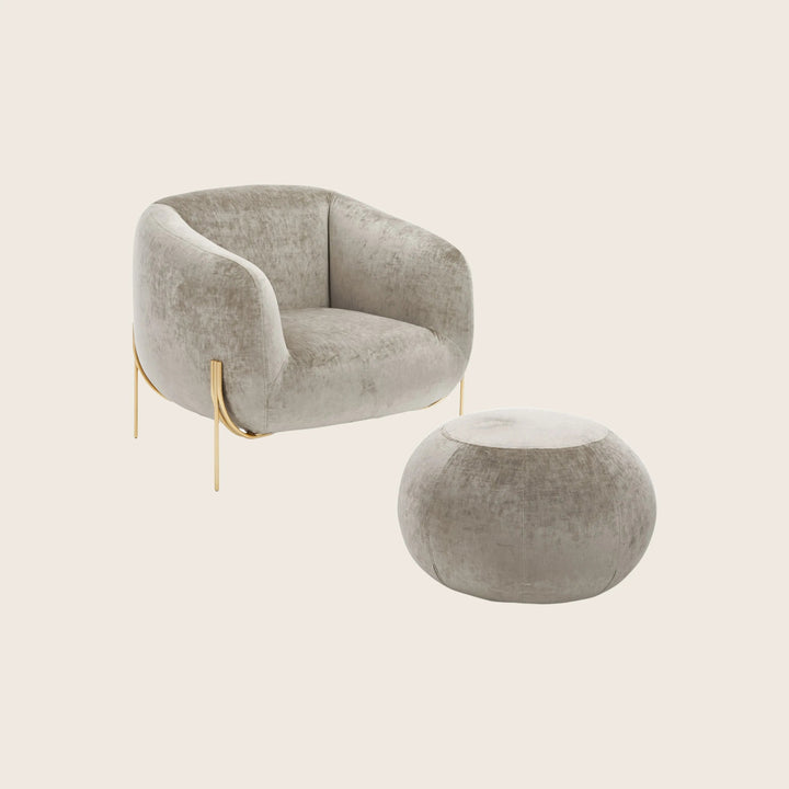 Modern armchair and pouf with elegant design in neutral colors