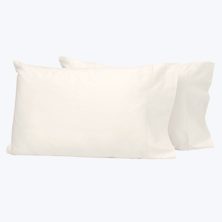 Two white pillowcases displayed on light background for product showcase