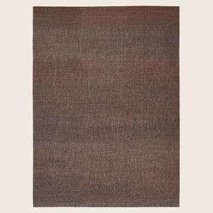 Brown textured surface resembling fabric or woven material, depth perception.